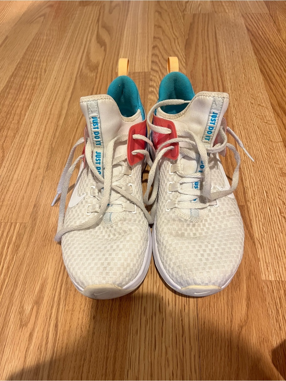 Nike White Athletic Sneakers with Teal and Coral Accents